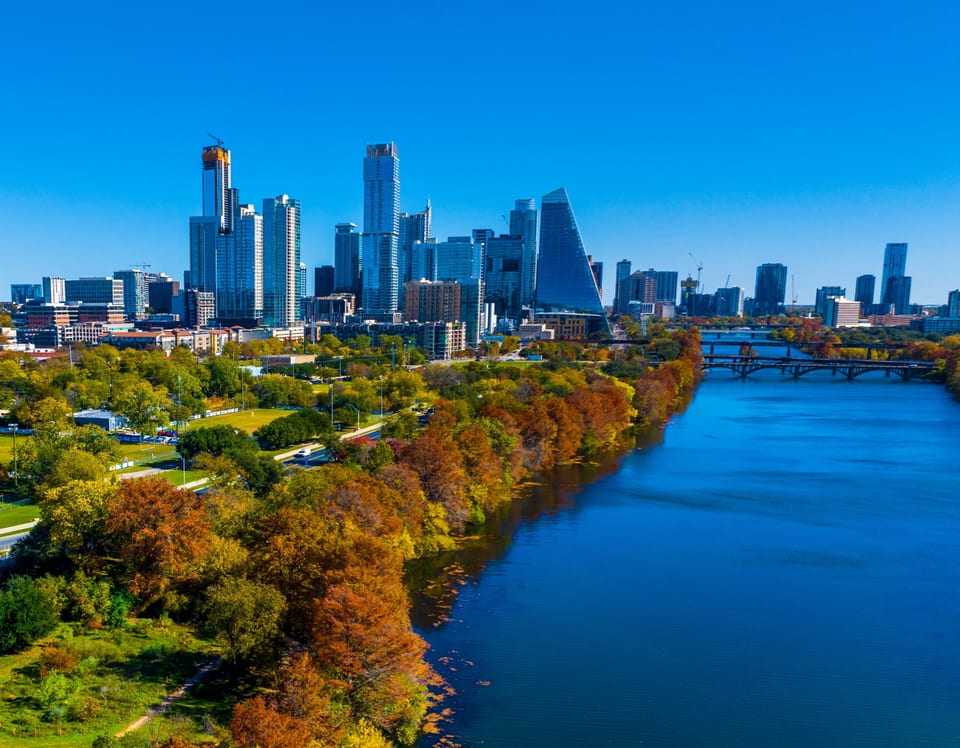 The Austin skyline over Lady Bird Lake in fall